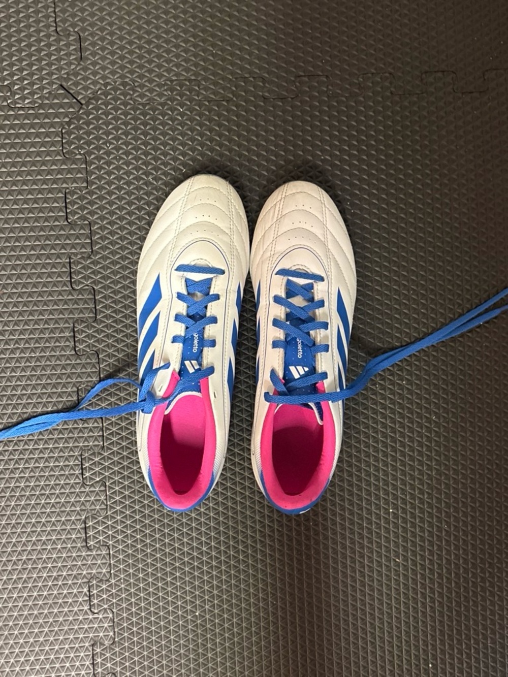 adidas Kids White cleats with Blue Stripes and Pink Lining
